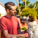 John, a TZIELD® (teplizumab-mzwv) patient, with his dog outdoors