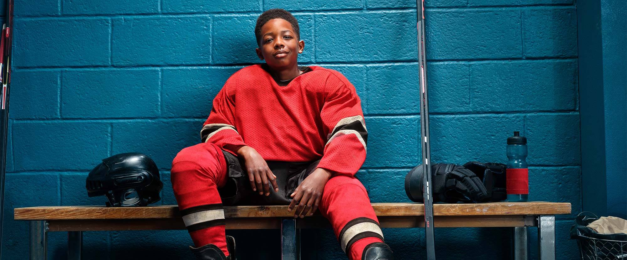 Image of a 10-year-old boy ready to play hockey